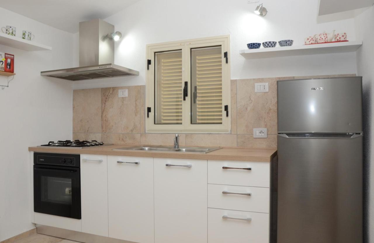 Apartments Villa Corrias Cala Liberotto Luaran gambar