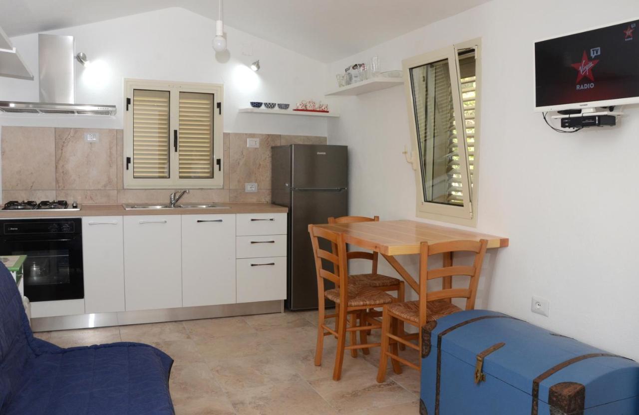 Apartments Villa Corrias Cala Liberotto Luaran gambar